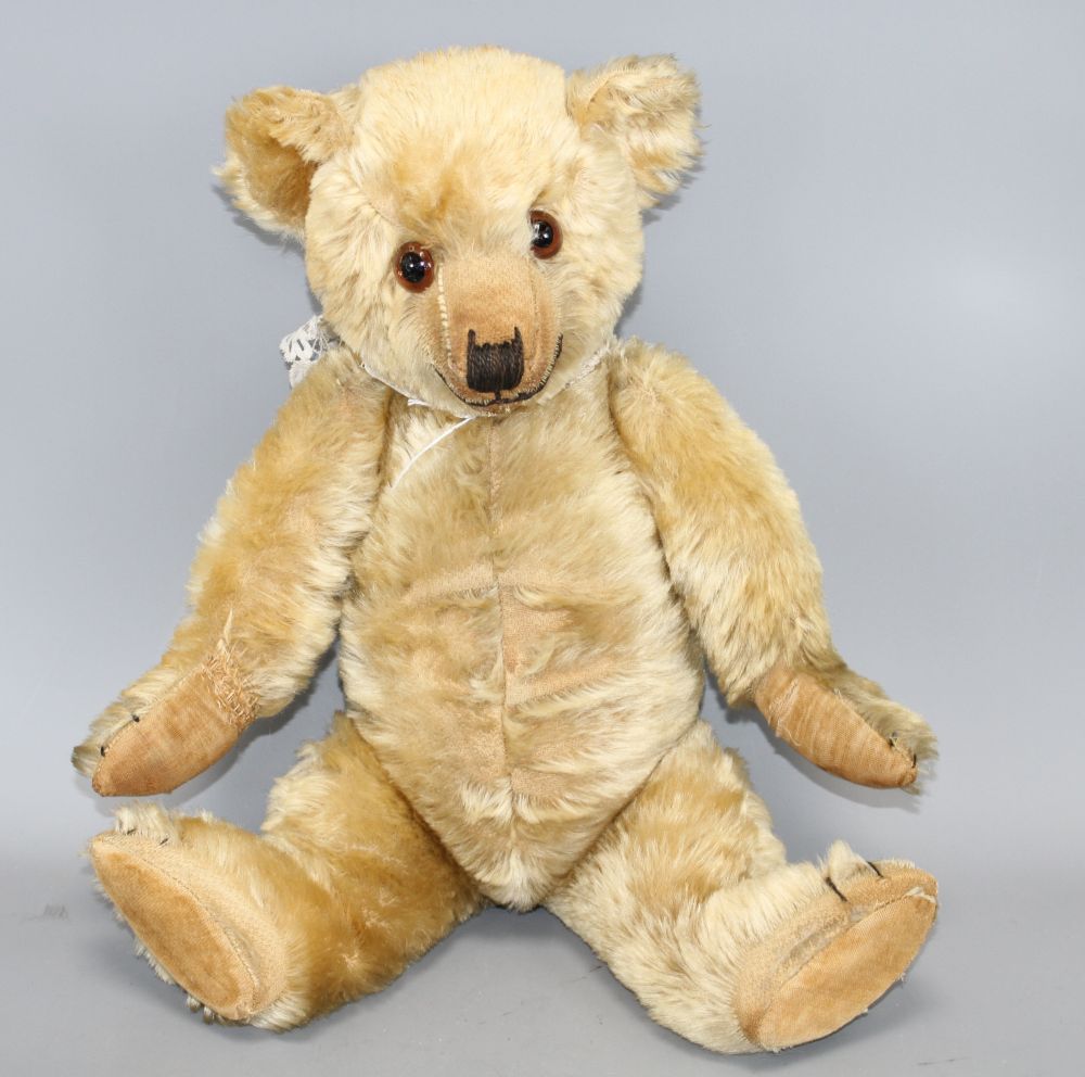 A Chiltern Hugmee c.1930 bear, 18in., blond mohair, hair loss front tummy, repair to right paw, split to left paw